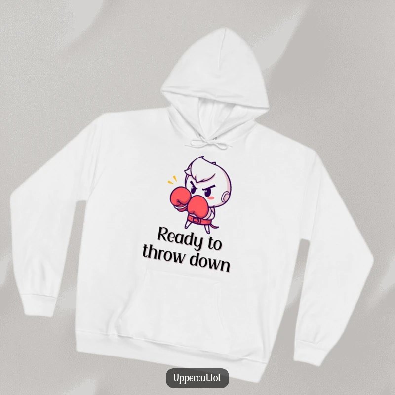 Funny Boxing Glove Punch Hoodie: Determined boxing glove character humorously throwing a punch, perfect for warm, funny training.