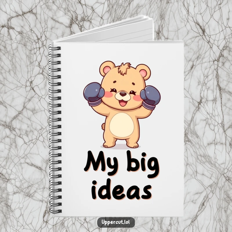 Funny notebook with a happy bear cub wearing boxing gloves, throwing a playful jab, inspiring creativity and organization.